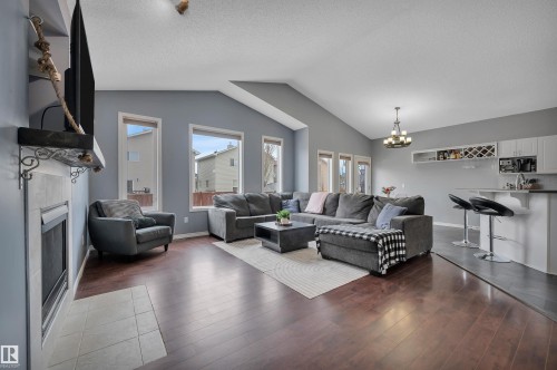 62 Douglas Crescent, Leduc, AB - Indoor Photo Showing Living Room With Fireplace