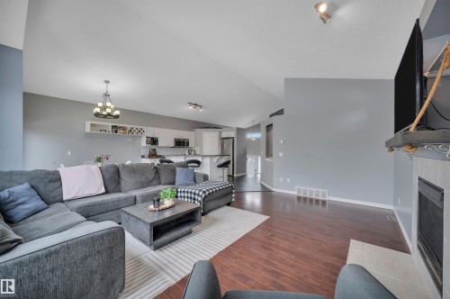 62 Douglas Crescent, Leduc, AB - Indoor Photo Showing Living Room With Fireplace