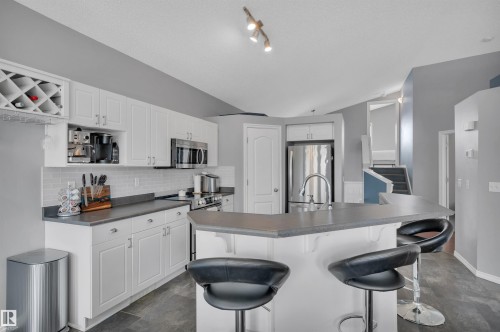 62 Douglas Crescent, Leduc, AB - Indoor Photo Showing Kitchen With Stainless Steel Kitchen