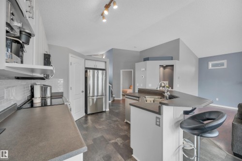 62 Douglas Crescent, Leduc, AB - Indoor Photo Showing Kitchen With Stainless Steel Kitchen With Double Sink