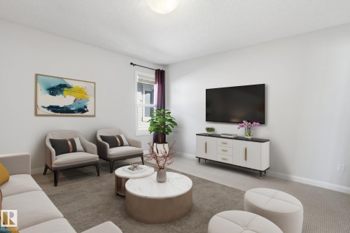 1220 Secord Landing Landing, Edmonton, AB - Indoor Photo Showing Living Room