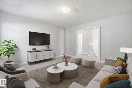 1220 Secord Landing Landing, Edmonton, AB - Indoor Photo Showing Living Room