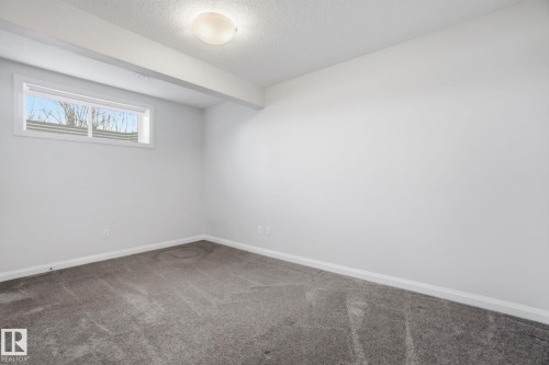 1220 Secord Landing Landing, Edmonton, AB - Indoor Photo Showing Other Room