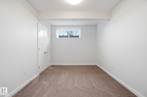 1220 Secord Landing Landing, Edmonton, AB - Indoor Photo Showing Other Room