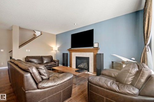 3689 Atkinson Loop, Edmonton, AB - Indoor Photo Showing Living Room With Fireplace