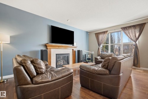 3689 Atkinson Loop, Edmonton, AB - Indoor Photo Showing Living Room With Fireplace