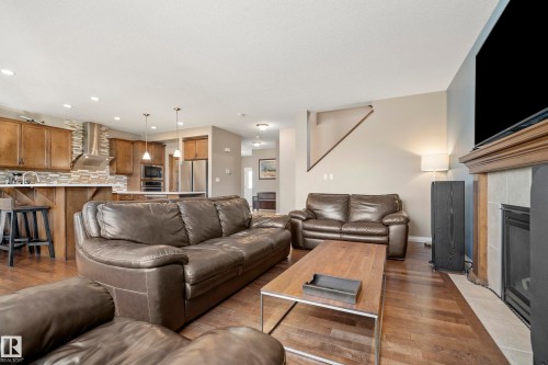 3689 Atkinson Loop, Edmonton, AB - Indoor Photo Showing Living Room With Fireplace