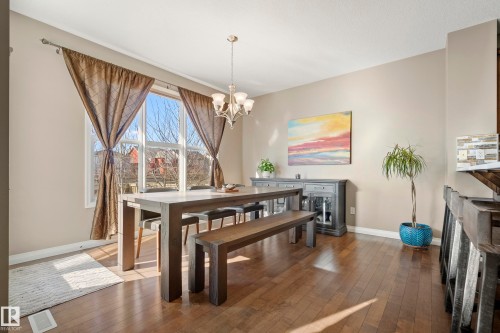 3689 Atkinson Loop, Edmonton, AB - Indoor Photo Showing Dining Room With Fireplace