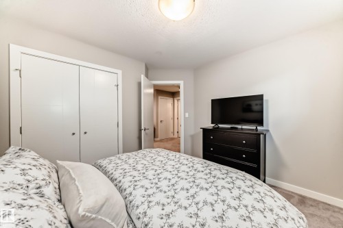 This room features light-colored walls and grey carpeting - 11 Etoile Cres N, St. Albert, AB - Indoor Photo Showing Bedroom