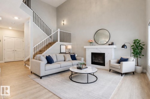 1424 29 Street, Edmonton, AB - Indoor Photo Showing Living Room With Fireplace