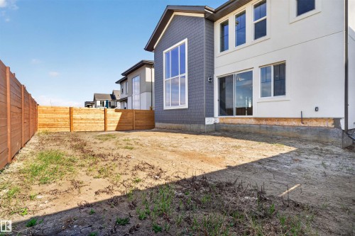 Expansive backyard with a new wood fence - 63 Jubilation Drive, St. Albert, AB - Outdoor