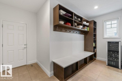 Secondary Main Floor Kitchen featuring Gas Stove, ample cabinet and counter space, and additional sink - 4476 Suzanna Crescent, Edmonton, AB - Indoor Photo Showing Kitchen With Double Sink