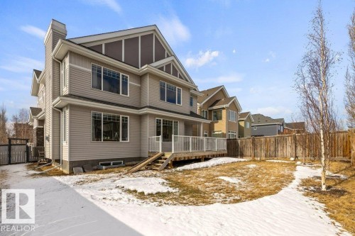 View of the Back Exterior of the home featuring Deck,  and fenced yard space - 4476 Suzanna Crescent, Edmonton, AB - Outdoor