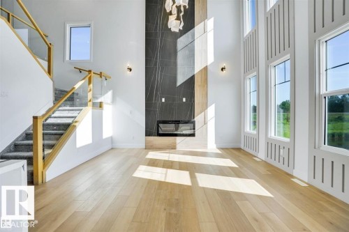 Entrance foyer - 47 Rosewood Way, St. Albert, AB - Indoor Photo Showing Other Room With Fireplace