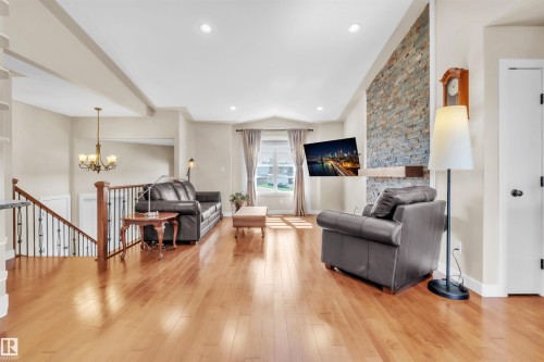 702 Pheasant Close, Cold Lake, AB - Indoor Photo Showing Other Room With Fireplace