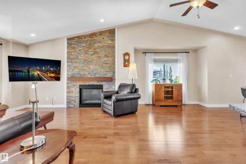 702 Pheasant Close, Cold Lake, AB - Indoor Photo Showing Living Room With Fireplace