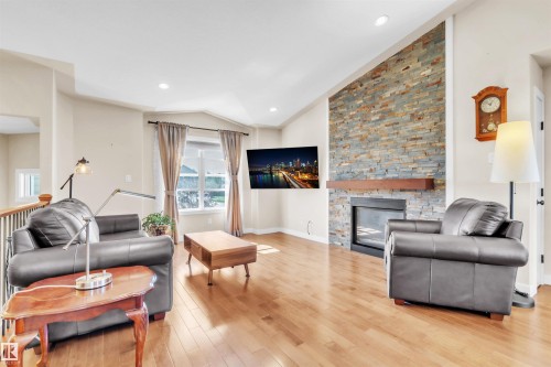 702 Pheasant Close, Cold Lake, AB - Indoor Photo Showing Living Room With Fireplace