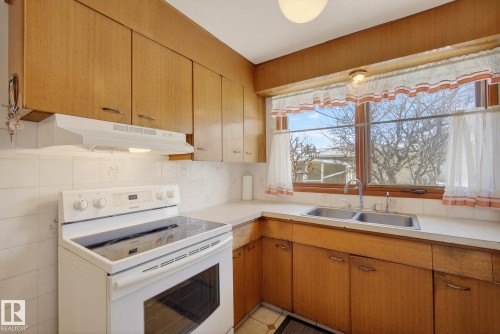 9145 152 Street, Edmonton, AB - Indoor Photo Showing Kitchen With Double Sink