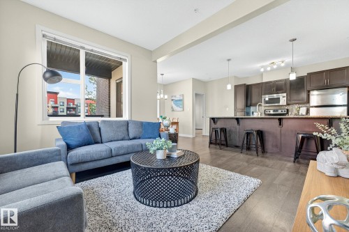 247 308 Ambleside Link, Edmonton, AB - Indoor Photo Showing Living Room