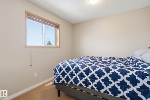 71 Caledonia Drive, Leduc, AB - Indoor Photo Showing Bedroom
