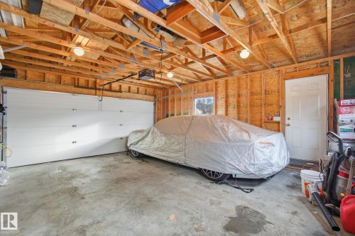 71 Caledonia Drive, Leduc, AB - Indoor Photo Showing Garage