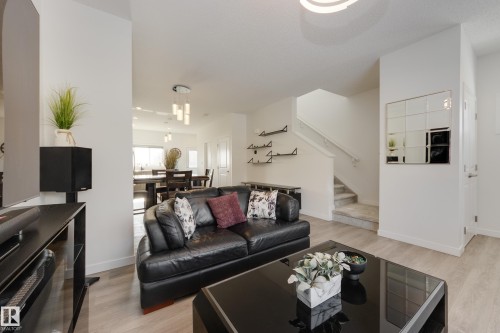5181 Edgemont Boulevard, Edmonton, AB - Indoor Photo Showing Living Room With Fireplace