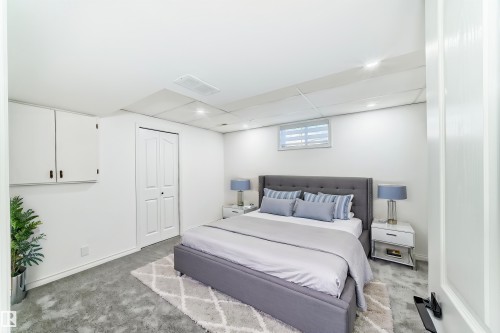 Bedroom with carpet floors, a closet, and recessed lighting - 4008 37 Avenue, Edmonton, AB - Indoor Photo Showing Bedroom