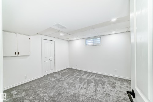 Basement featuring carpet floors, recessed lighting, and a drop ceiling - 4008 37 Avenue, Edmonton, AB - Indoor