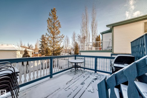 View of snow covered deck - 4008 37 Avenue, Edmonton, AB - Outdoor With Exterior