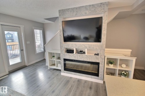 846 Daniels Way, Edmonton, AB - Indoor Photo Showing Living Room With Fireplace