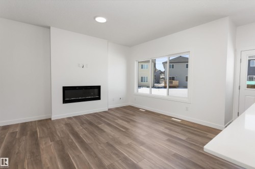 4028 207 Street, Edmonton, AB - Indoor Photo Showing Living Room With Fireplace