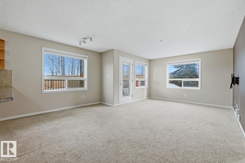 125 1520 Hammond Gate Nw, Edmonton, AB - Indoor Photo Showing Other Room