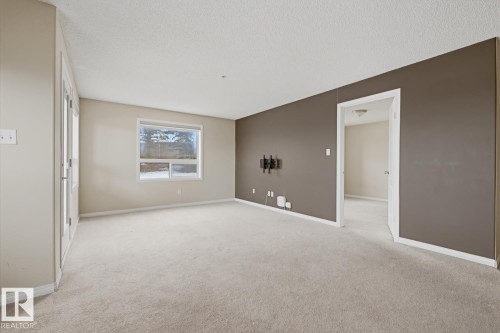125 1520 Hammond Gate Nw, Edmonton, AB - Indoor Photo Showing Other Room