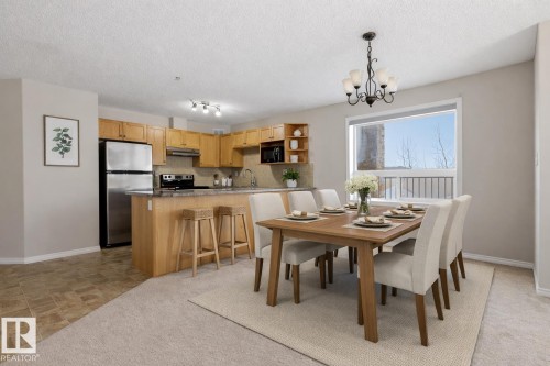 125 1520 Hammond Gate Nw, Edmonton, AB - Indoor Photo Showing Dining Room
