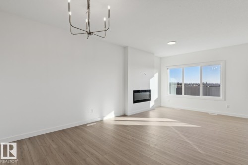 2523 210 Street, Edmonton, AB - Indoor Photo Showing Other Room With Fireplace