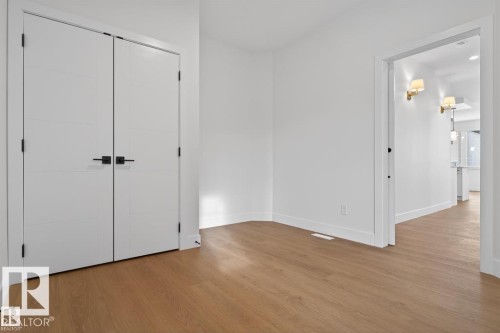 The room features light-toned flooring and white walls, creating a bright atmosphere - 5 Rosa Crescent, St. Albert, AB - Indoor Photo Showing Other Room