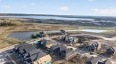 Developing residential area featuring a variety of housing styles and new construction, with proximity to natural water features - 11 Redbud Way, St. Albert, AB  - Outdoor With Body Of Water With View 