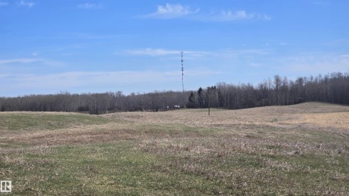Expansive open land with rolling terrain and varied natural grasses - 11 Twin Lakes Drive, Rural Lamont County, AB 