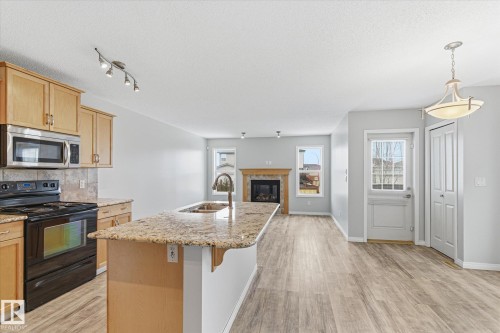 424 Songhurst Place, Leduc, AB - Indoor Photo Showing Kitchen With Double Sink With Upgraded Kitchen