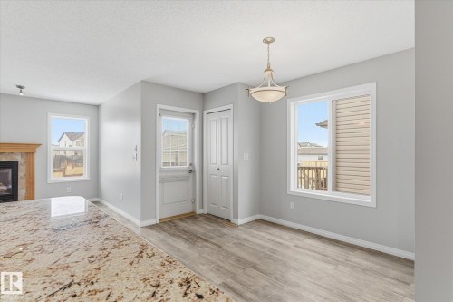 424 Songhurst Place, Leduc, AB - Indoor With Fireplace