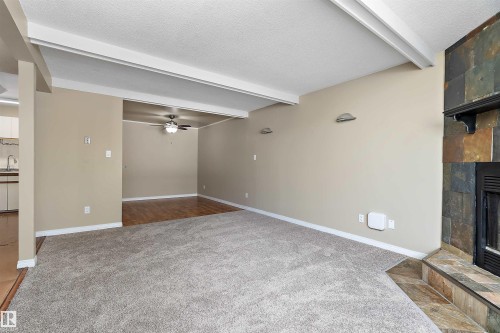 14583 121 Street, Edmonton, AB - Indoor Photo Showing Other Room With Fireplace