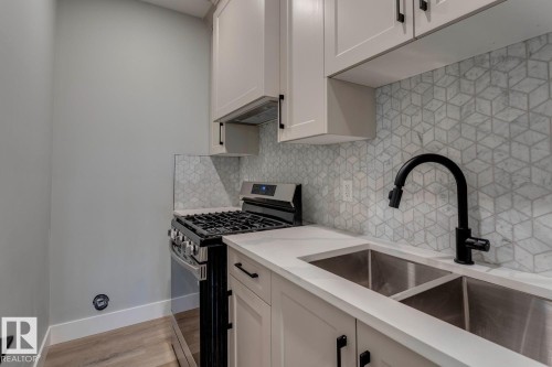 3612 Triomphe Boulevard, Beaumont, AB - Indoor Photo Showing Kitchen With Double Sink