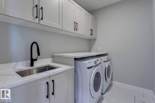 3612 Triomphe Boulevard, Beaumont, AB - Indoor Photo Showing Laundry Room