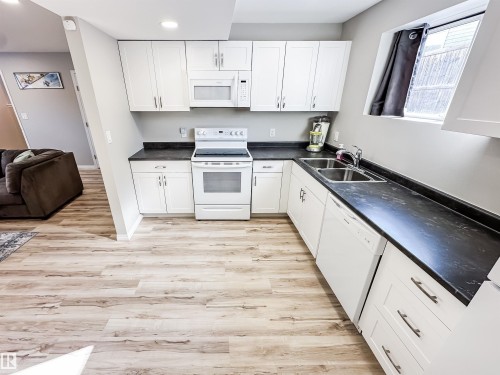 13036 139 Street, Edmonton, AB - Indoor Photo Showing Kitchen With Double Sink