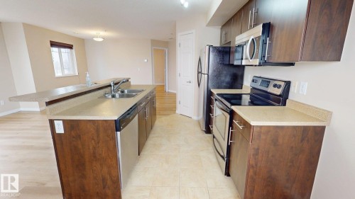 315 6925 199 Street, Edmonton, AB - Indoor Photo Showing Kitchen With Stainless Steel Kitchen With Double Sink