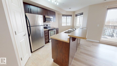 315 6925 199 Street, Edmonton, AB - Indoor Photo Showing Kitchen With Stainless Steel Kitchen With Double Sink