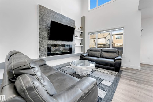 415 42 Street, Edmonton, AB - Indoor Photo Showing Living Room With Fireplace