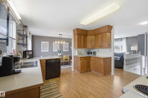 6008 54 Avenue, Camrose, AB - Indoor Photo Showing Kitchen With Double Sink