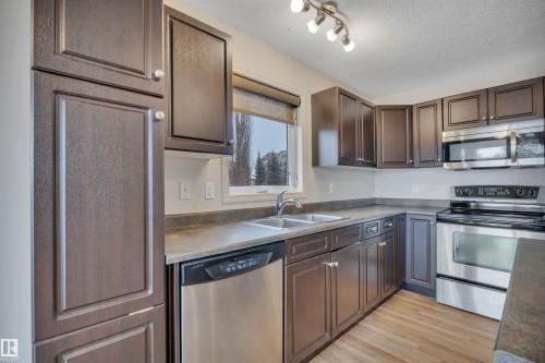 178 Keystone Crescent, Leduc, AB - Indoor Photo Showing Kitchen With Stainless Steel Kitchen With Double Sink