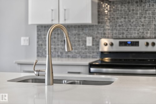 36 Riviere, St. Albert, AB - Indoor Photo Showing Kitchen With Double Sink With Upgraded Kitchen